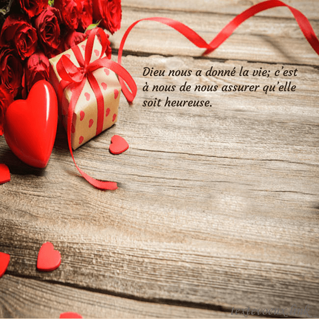 Carte de vœux avec coeur rouge et cadeau
