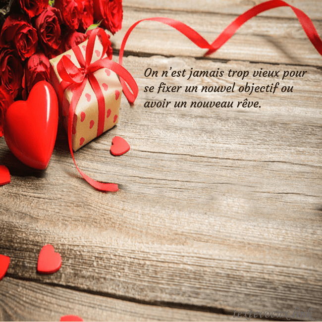 Carte de vœux avec coeur rouge et cadeau